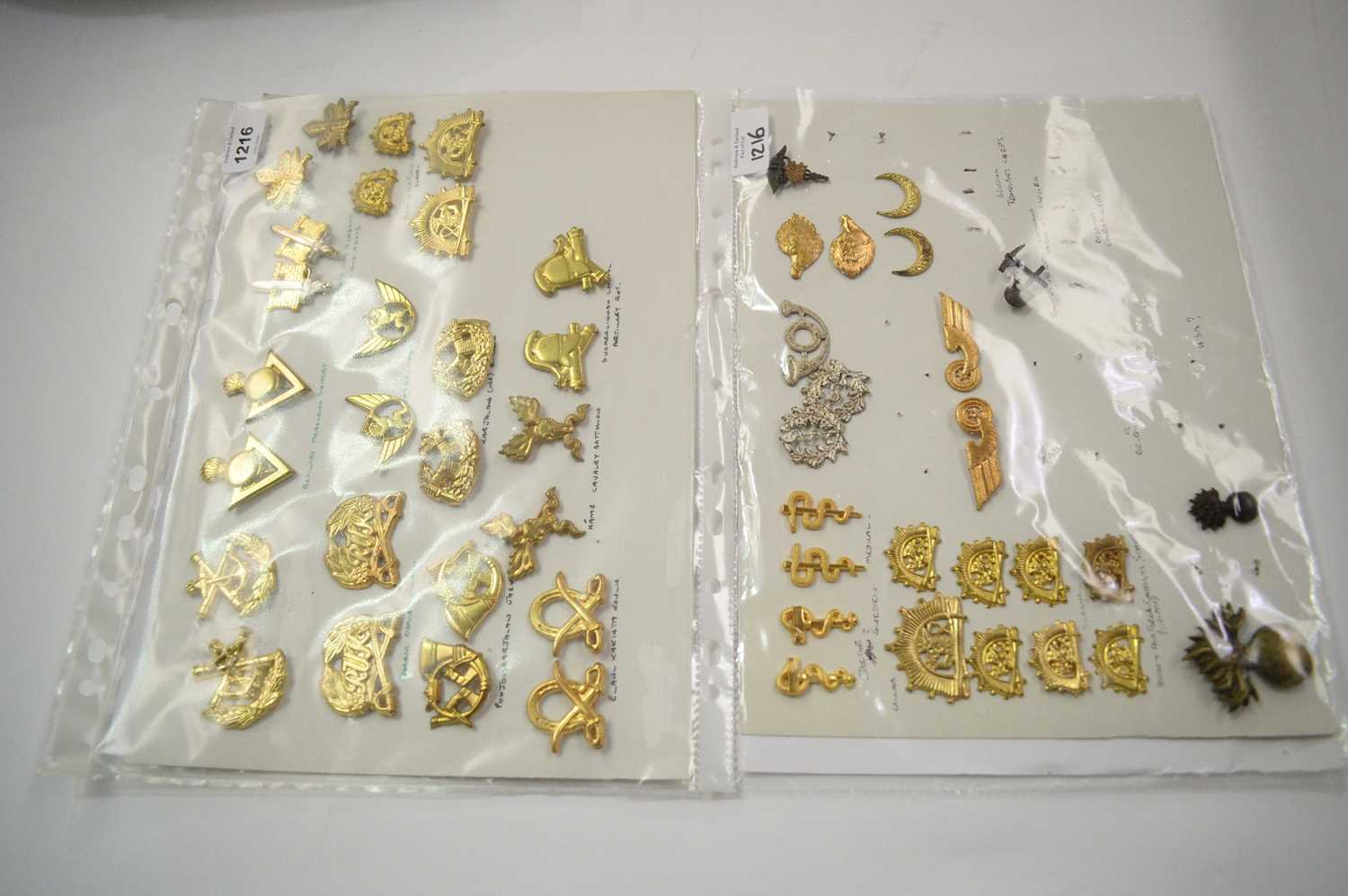 Lot 1216 - A collection of 22 pairs and 5 single Finnish Military badges.
