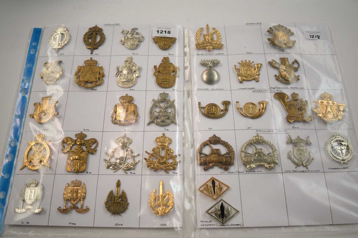 Lot 1218 - A collection 34 Belgian Infantry cap badges.