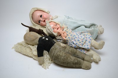 Lot 780 - Early 20th C doll's pram, two dolls and two soft toys.