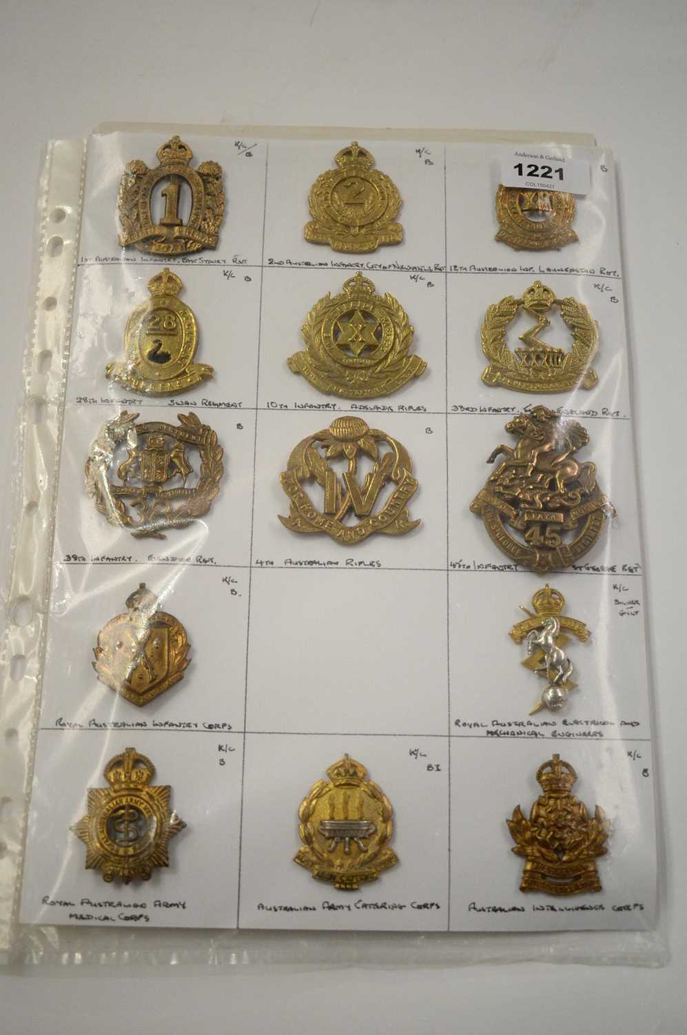 Lot 1221 - A collection of 14 Australian metal cap badges.