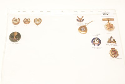 Lot 1237 - A collection of 10 sweetheart brooches.
