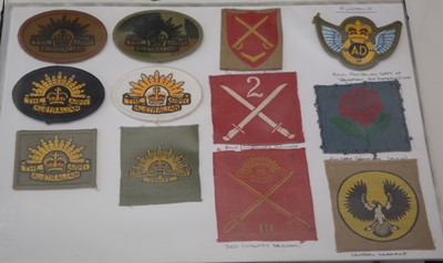 Lot 1240 - A collection of 105 Australian cloth shoulder titles.
