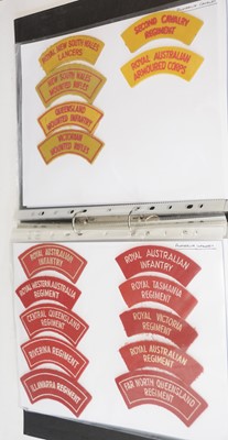 Lot 1240 - A collection of 105 Australian cloth shoulder titles.