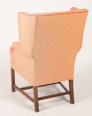 Lot 852 - A Georgian style wingback armchair