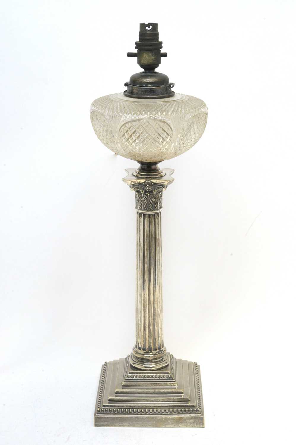Lot 147 - A late Victorian silver oil lamp.