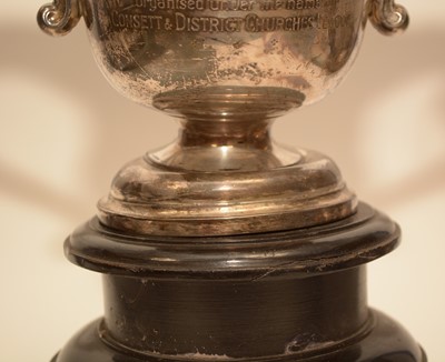 Lot 219 - An early 20th century silver two handled trophy cup