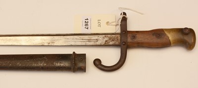 Lot 1267 - WWI French bayonet in metal scabbard.