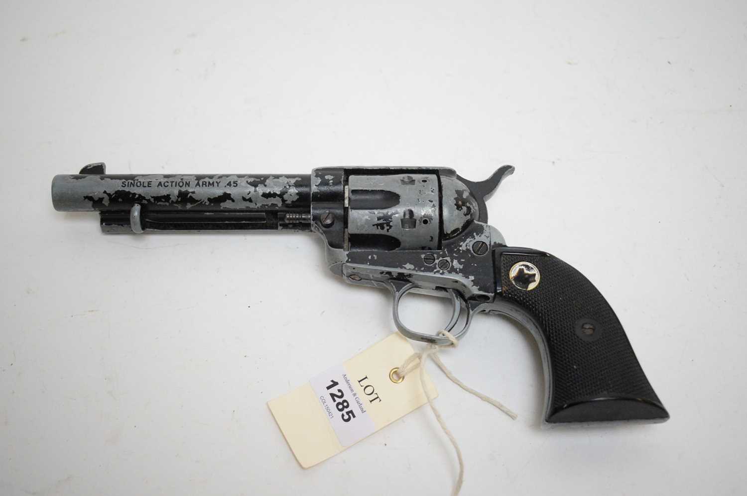 Lot 1285 - A replica single-action Colt Army .45 blank firing pistol.