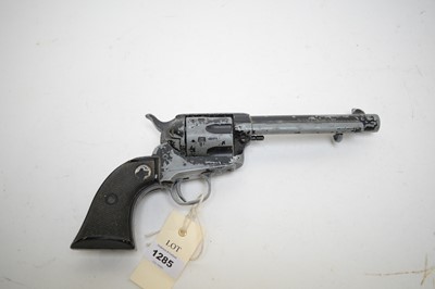 Lot 1285 - A replica single-action Colt Army .45 blank firing pistol.