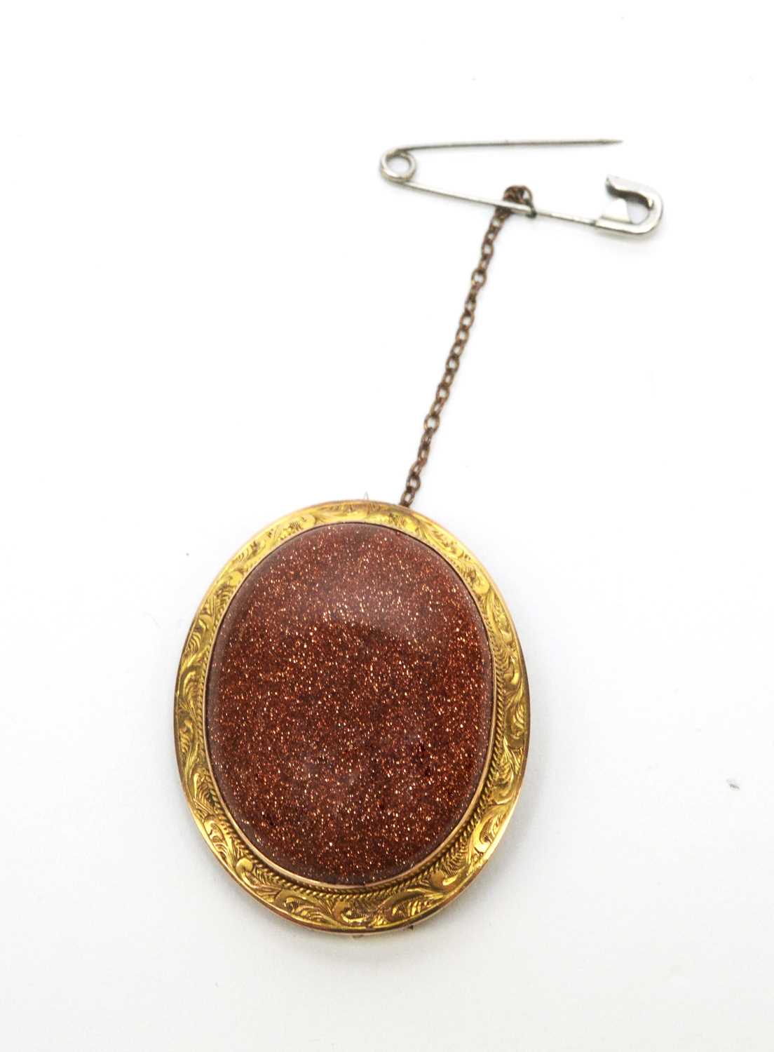 Lot 50 - A late 19th Century goldstone brooch.