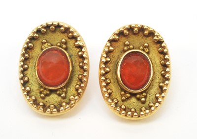 Lot 59 - A pair of fire opal and yellow metal earrings.