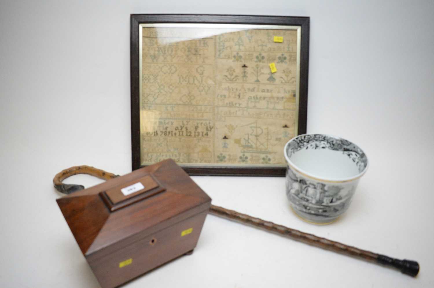 Lot 383 - Tea caddy, sampler, cachepot, and silver-mounted cane.