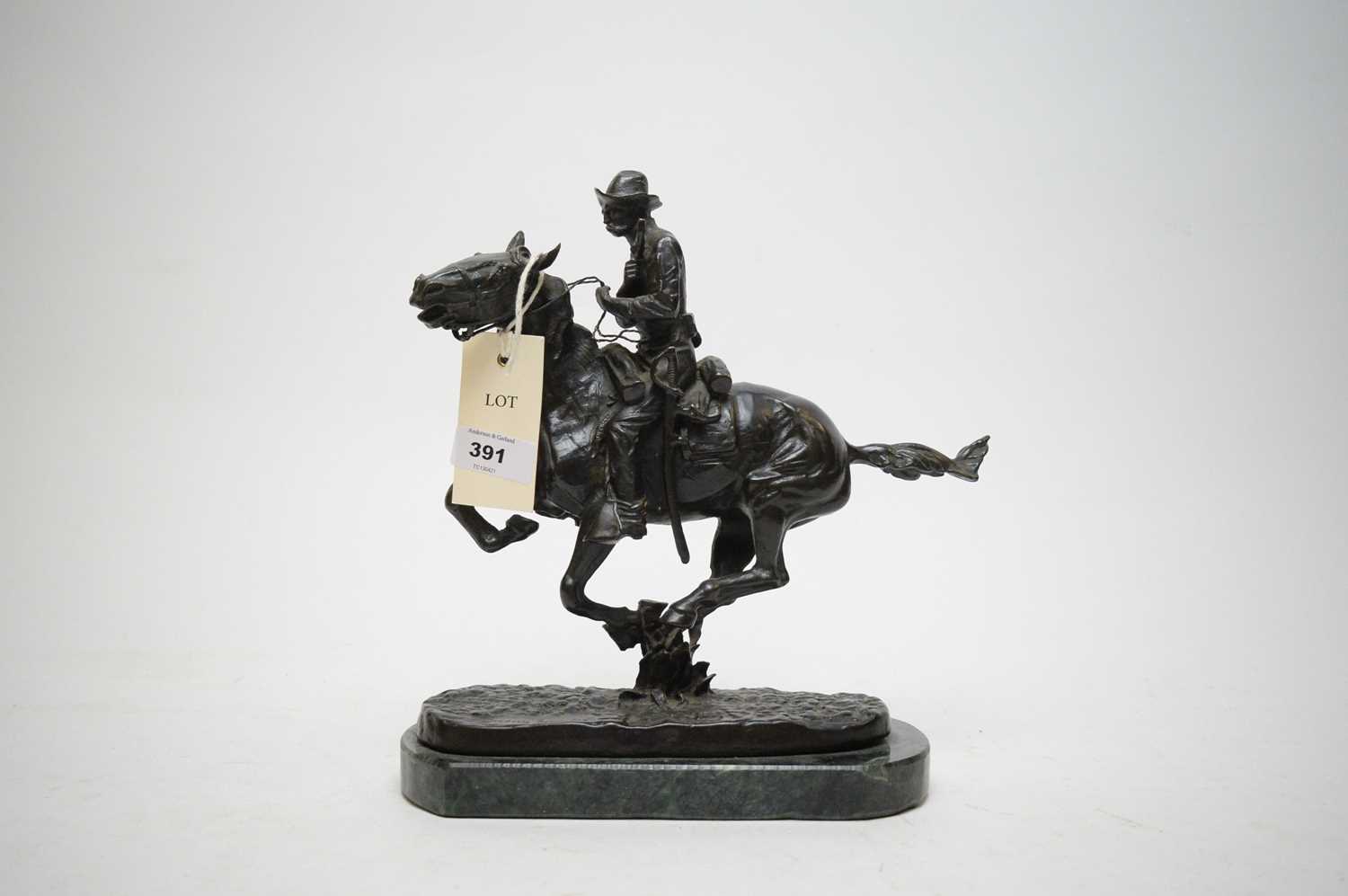 Lot 391 - After Frederick Remington - Cavalryman on galloping horse.