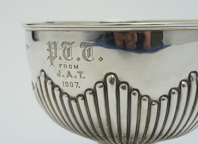 Lot 165 - An Edwardian silver sugar bowl and spoon.