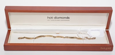 Lot 186 - Hot diamond 9ct. yellow gold bracelet.