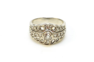 Lot 73 - A diamond dress ring