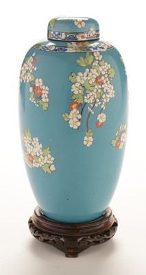 Lot 521 - Doulton bone china vase and cover