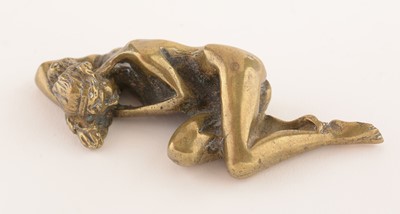 Lot 806 - Small reclining bronze nude