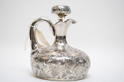 Lot 395 - Silver plate overlay cut glass decanter.