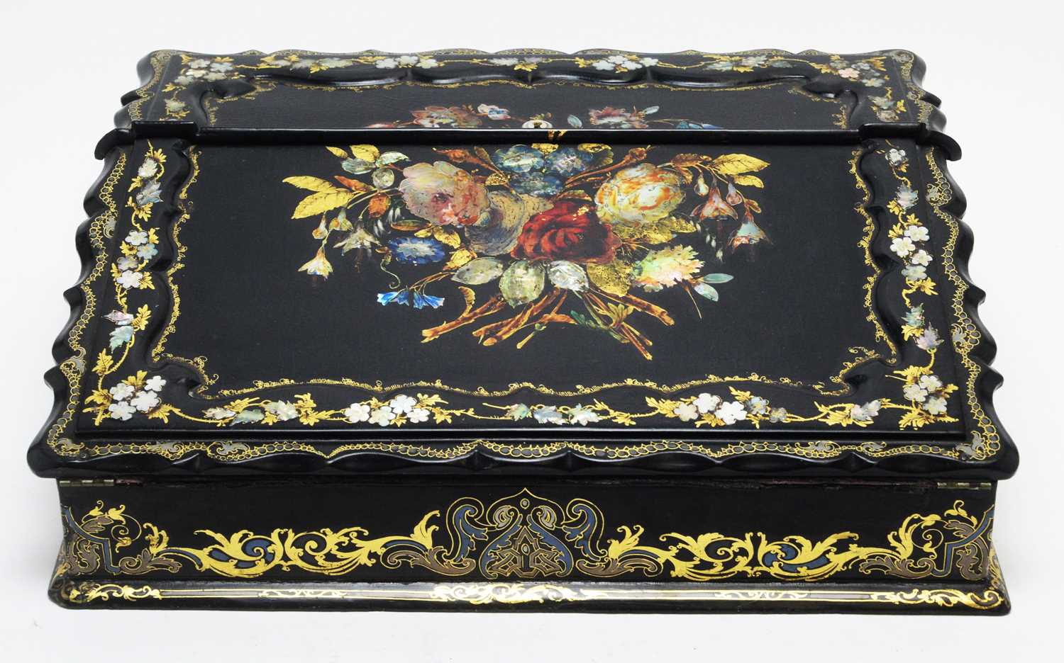 Lot 790 - A 19th Century black lacquered writing slope.
