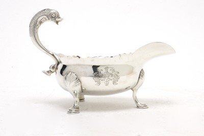 Lot 148 - A George III silver sauceboat.