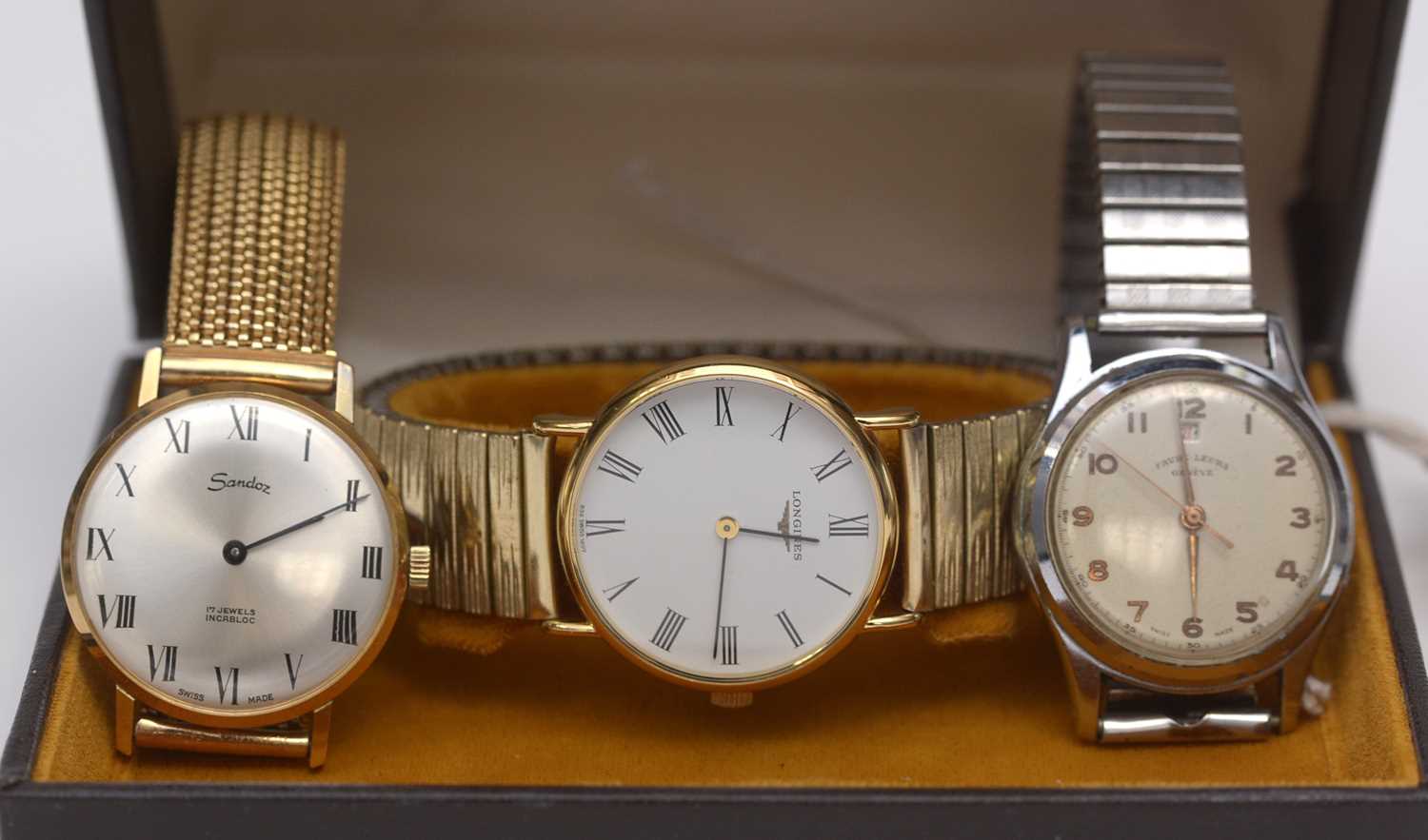 Lot 229 - Three wristwatches.