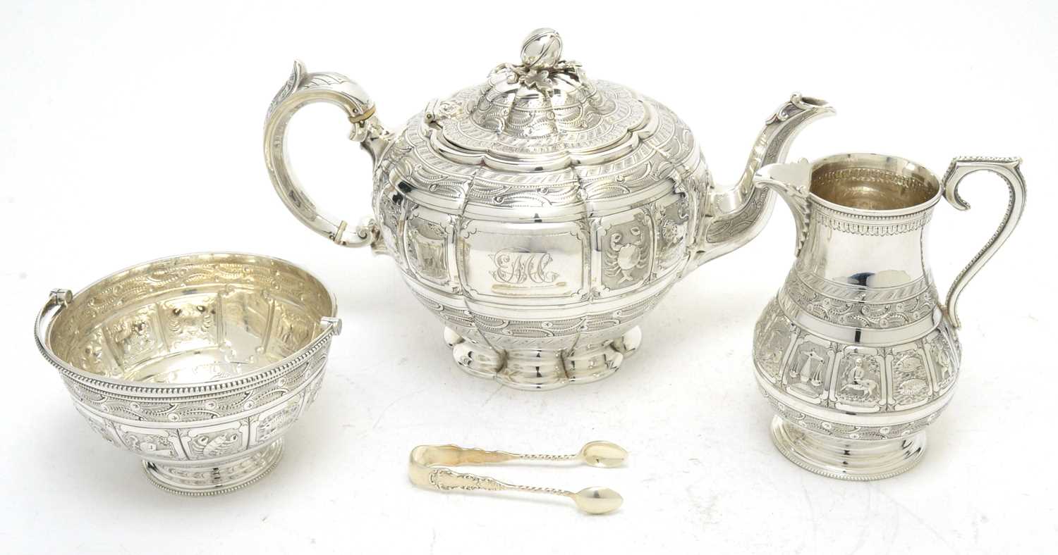 Lot 149 - A Victorian silver teapot, with associated sugar basket and milk jug; and sugar tongs.