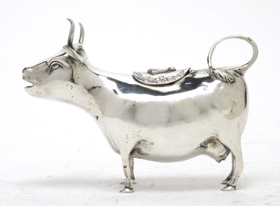 Lot 195 - An early 20th Century Dutch silver cow creamer.