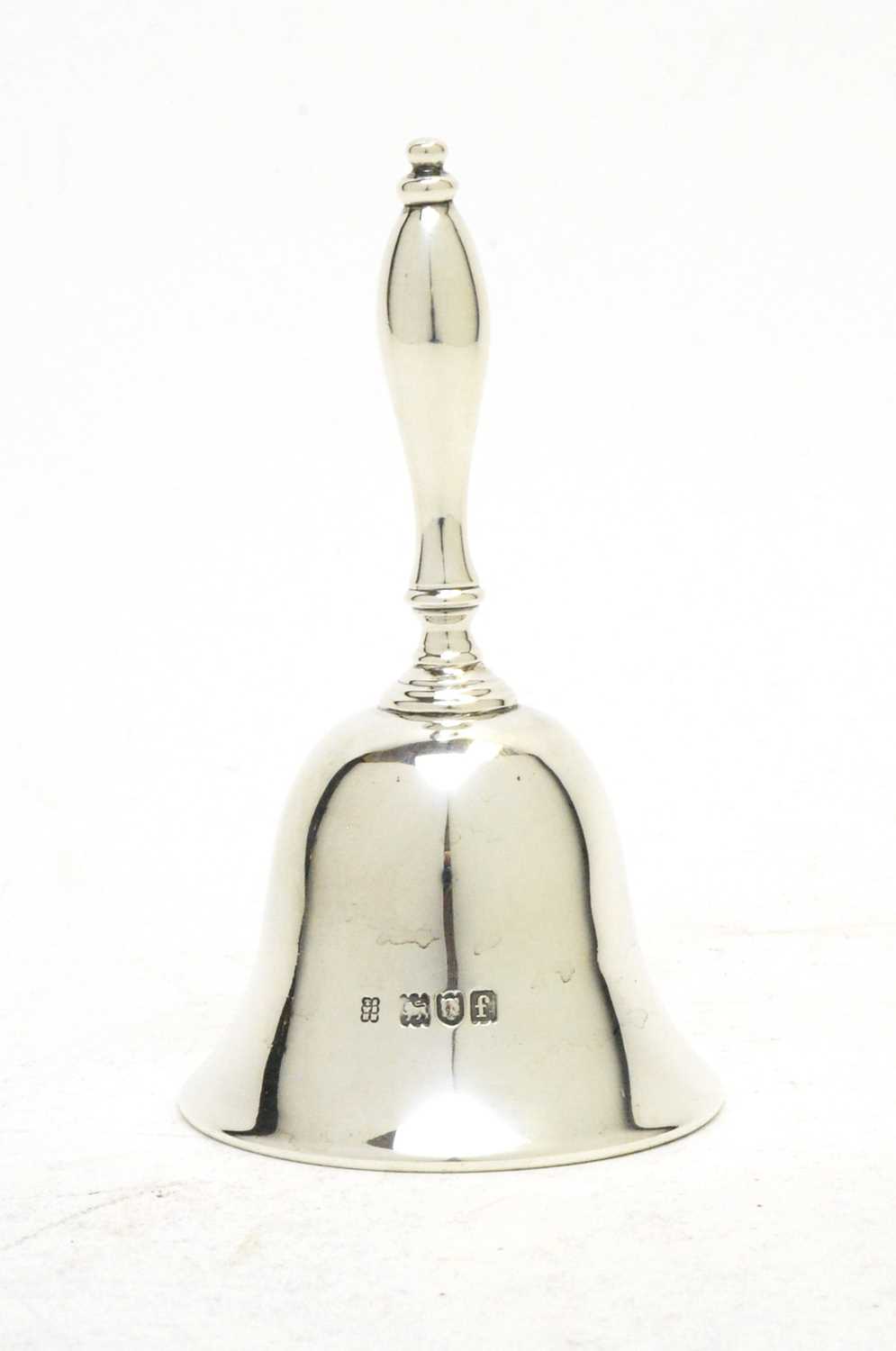 Lot 212 - An Edwardian silver table bell.