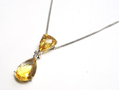Lot 15 - A citrine and diamond drop pendant