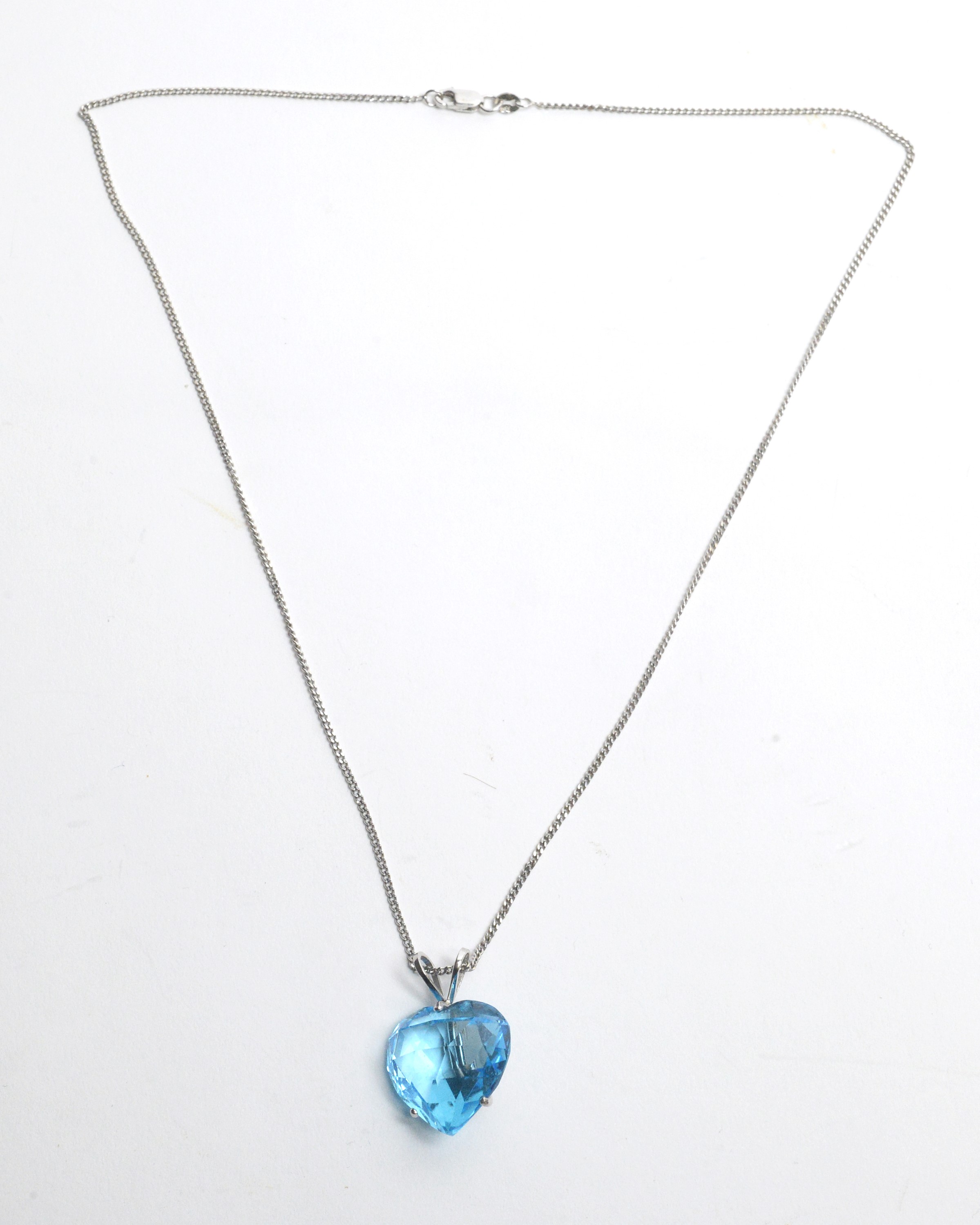 Lot 26 - A Heart Shaped Blue Topaz Pendant