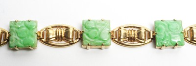 Lot 32 - Carved jade and 9ct yellow gold bracelet