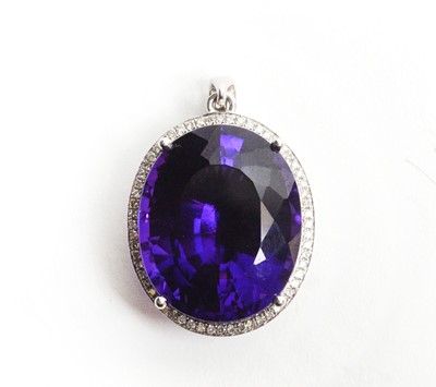 Lot 34 - An amethyst and diamond cluster pendant