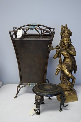 Lot 218 - Repro Indian brass deity; magazine rack; and Asian stand.