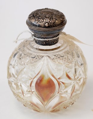 Lot 214 - Silver-mounted cut-glass scent bottle.