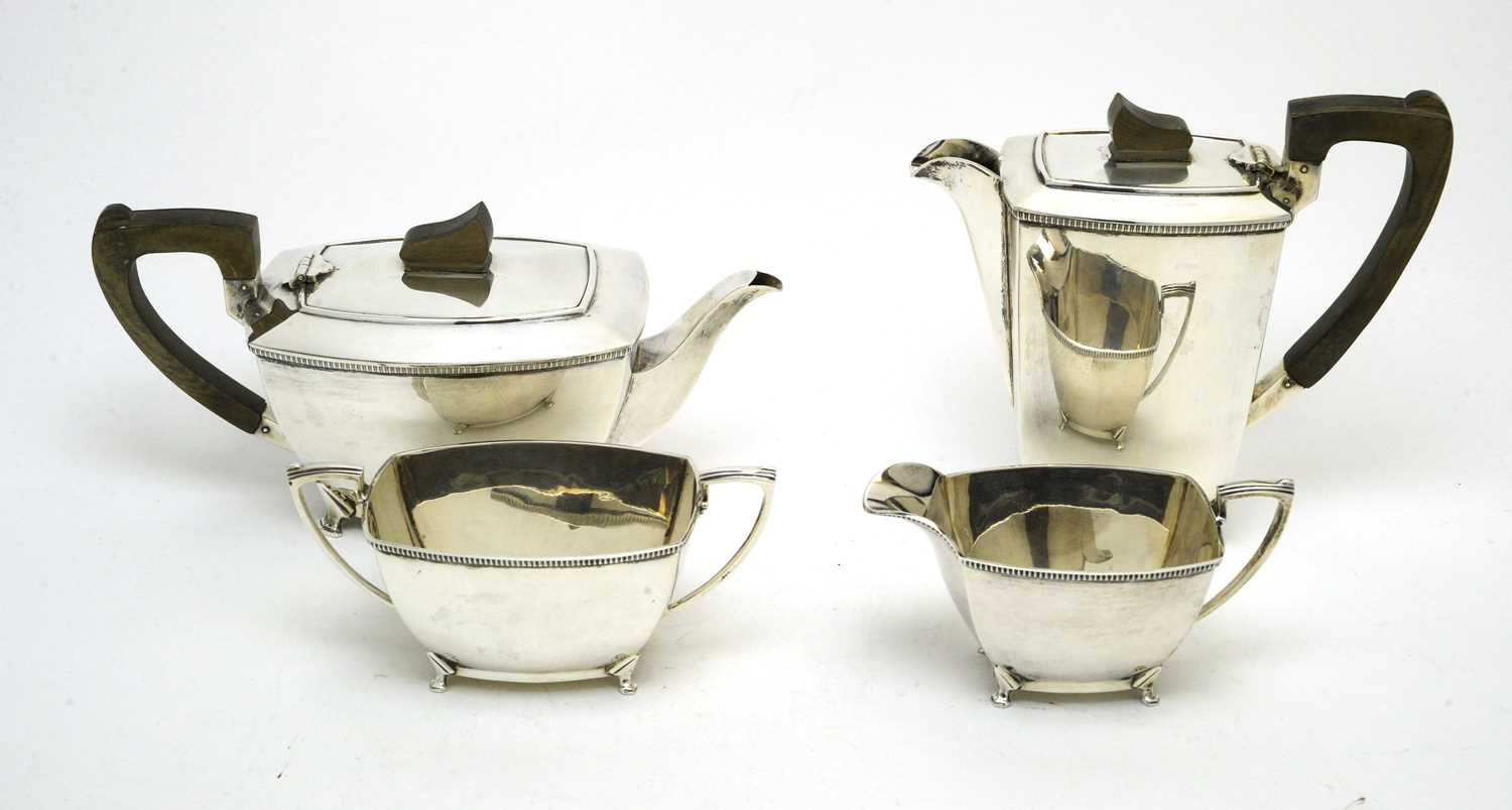Lot 184 - An Elizabeth II Art Deco style four-piece tea service.