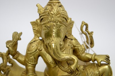 Lot 397 - Modern Indian gilt brass figure of Ganesh.