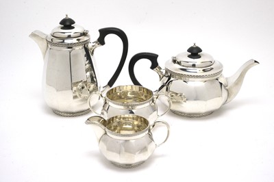 Lot 181 - A George V silver four-piece tea service.