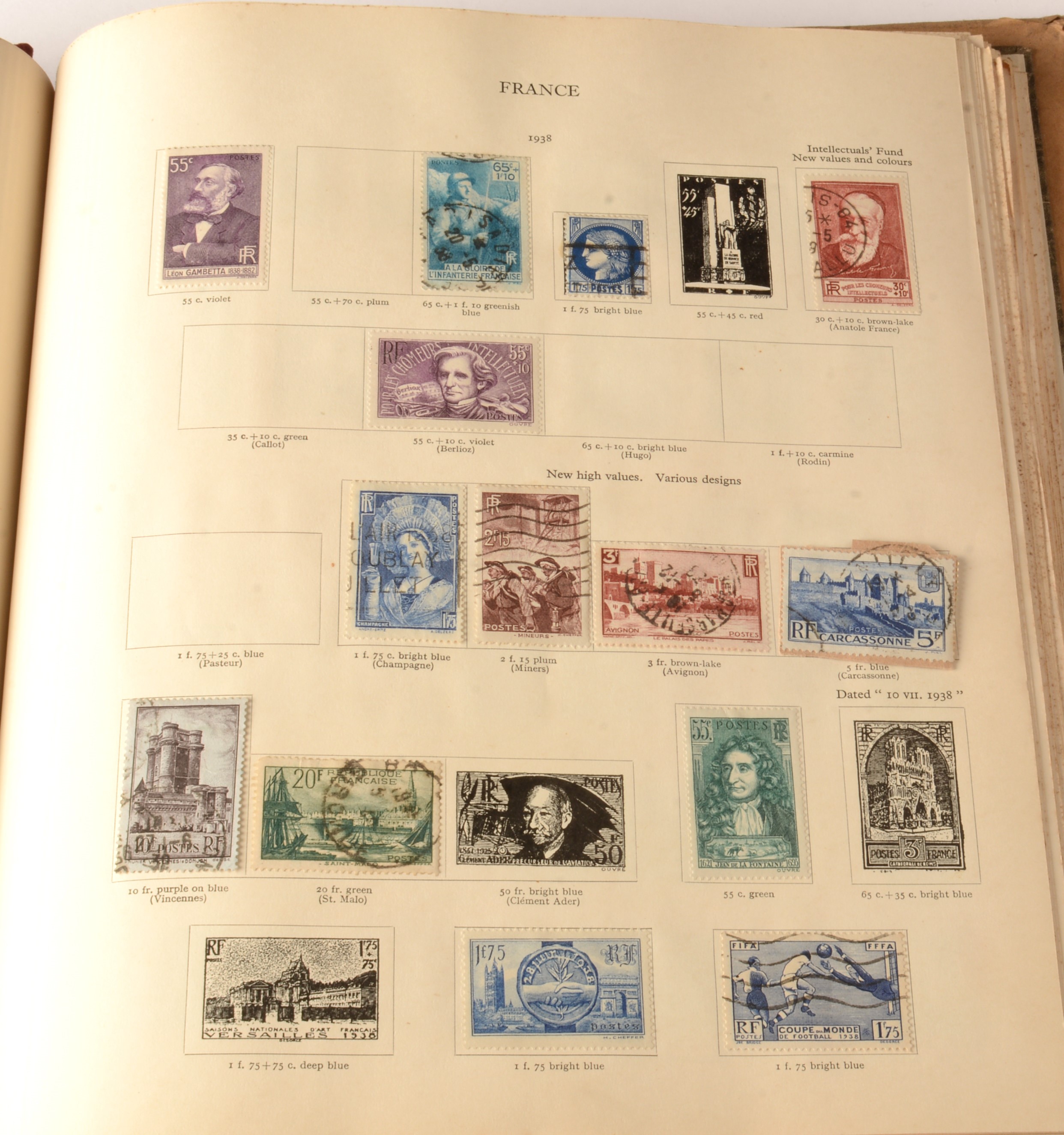 TWO STAMP ALBUMS - THE IDEAL POSTAGE STAMP ALBUM. Coins, Medals