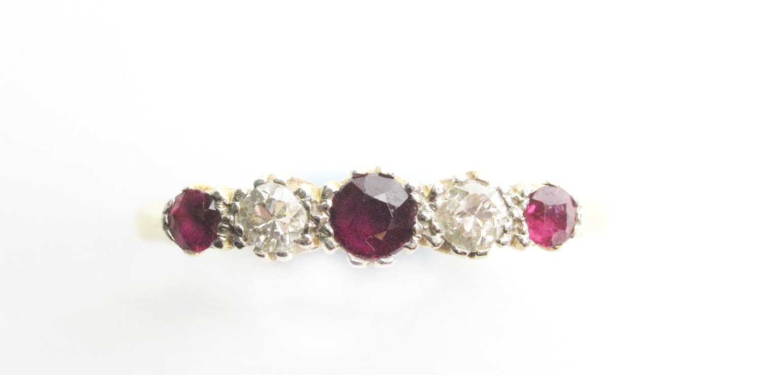 Lot 14 - A ruby and diamond ring
