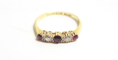 Lot 14 - A ruby and diamond ring