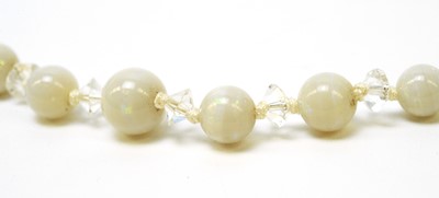 Lot 179 - A white opal bead and crystal necklace.