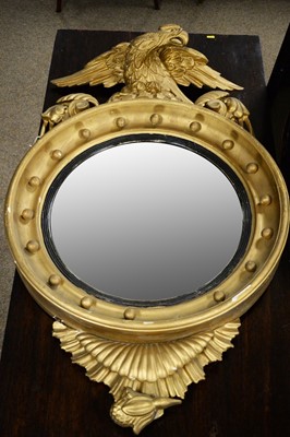 Lot 28 - A 20th Century reproduction convex wall mirror; together with another