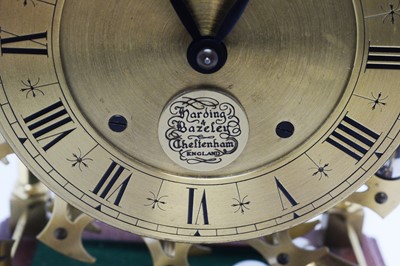 Lot 771 - A modern lacquered brass spherical weight clock.