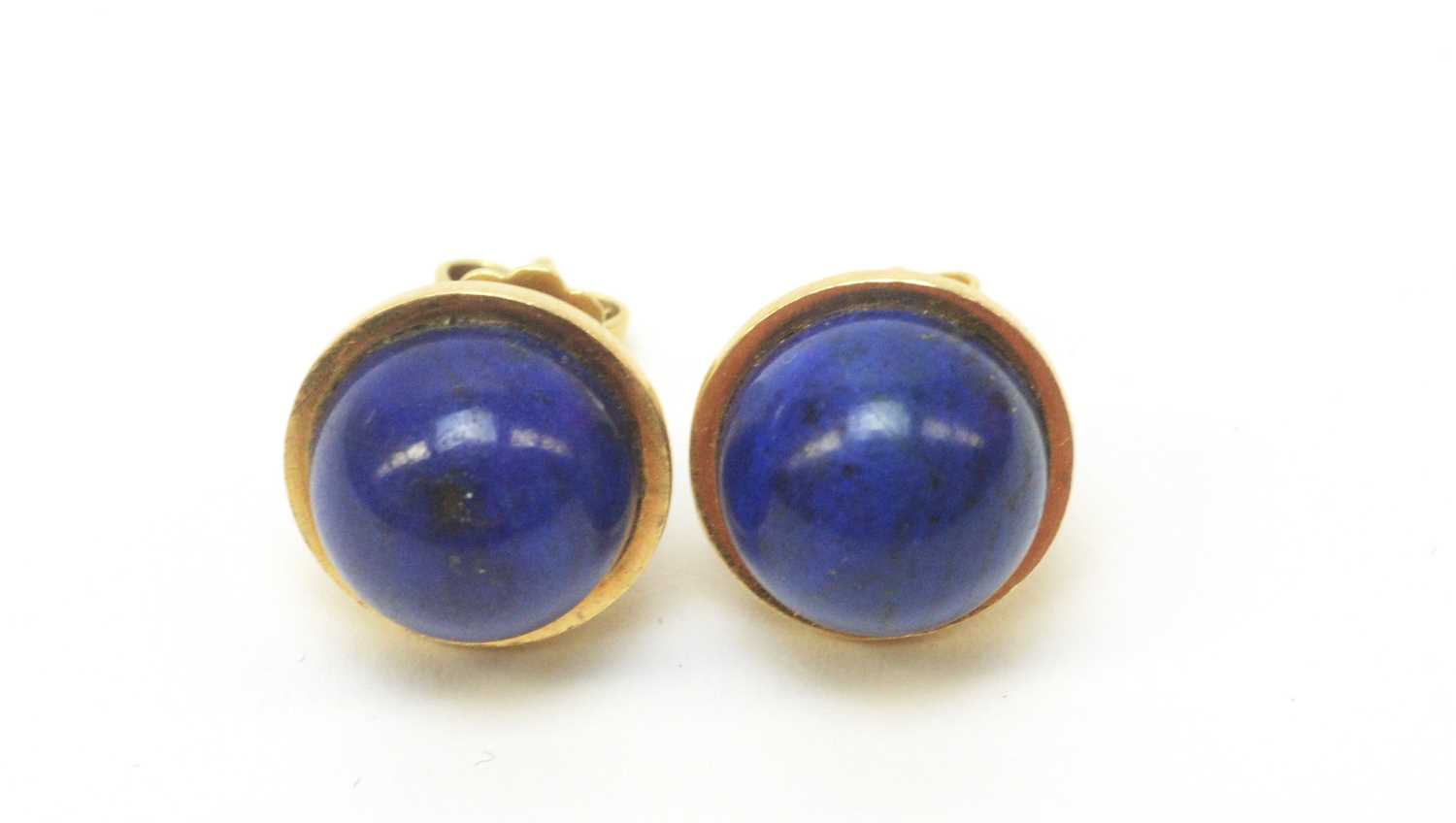 Lot 6 - A pair of lapis lazuli stud earrings.