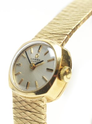 Lot 129 - 9ct yellow gold Omega Automatic cocktail watch