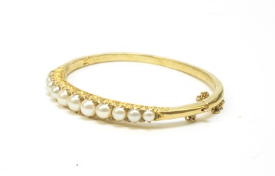 Lot 83 - Pearl and diamond bangle