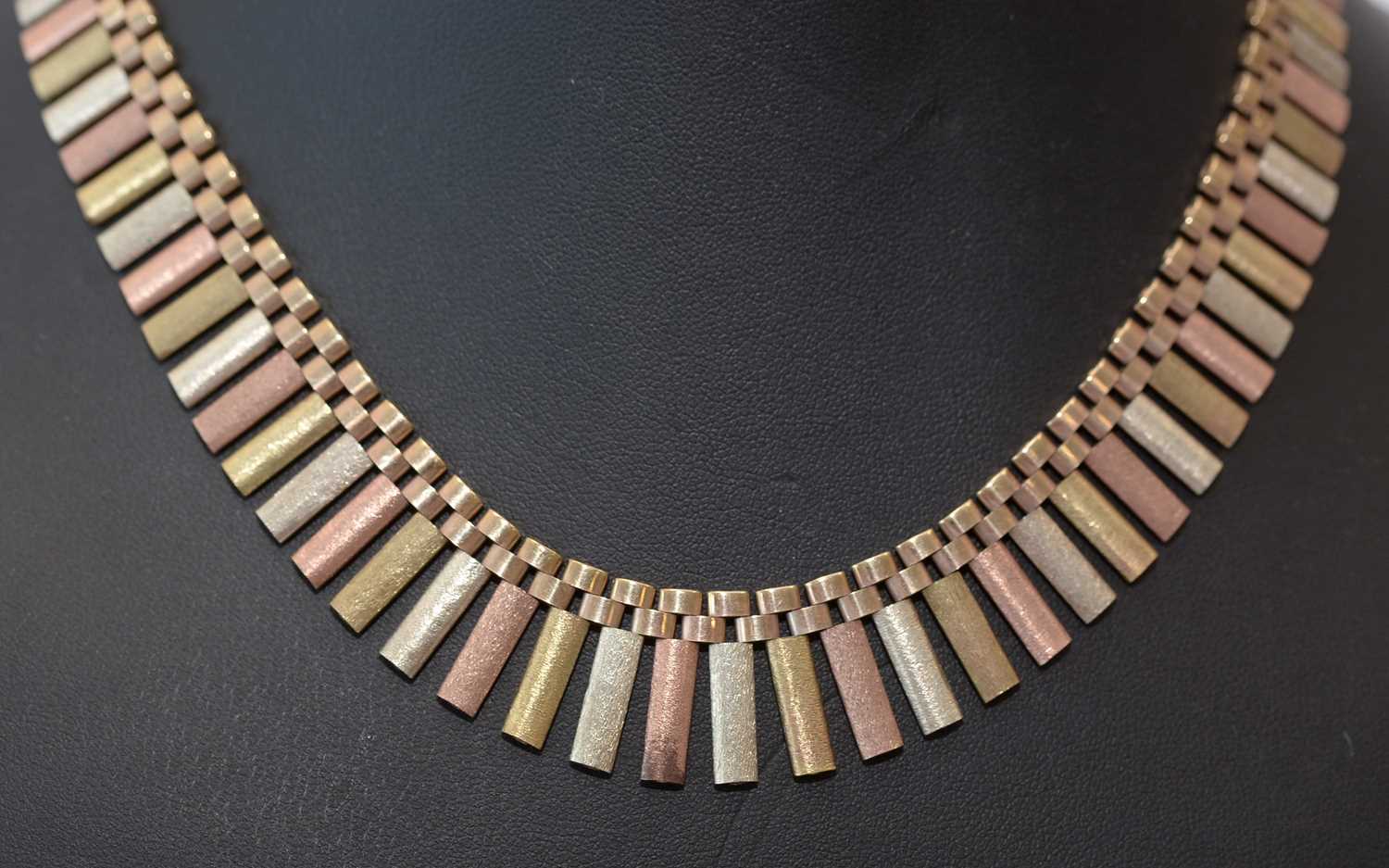 Lot 178 - 9ct yellow, white and rose gold fringe necklace