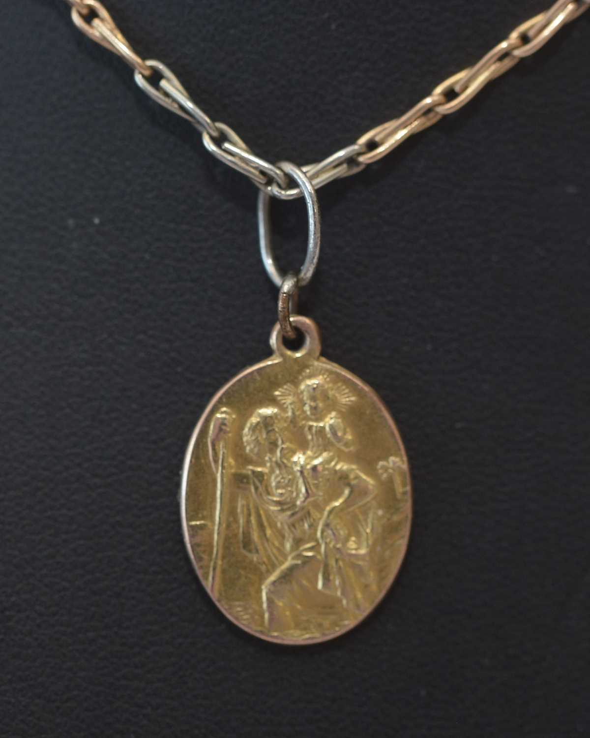 Lot 180 - Gold chain and St Christopher medal