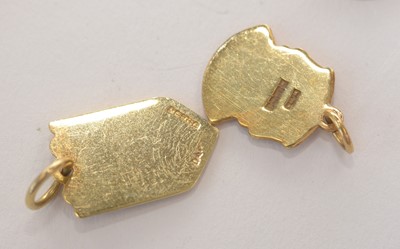 Lot 179 - Gold cufflinks and charms